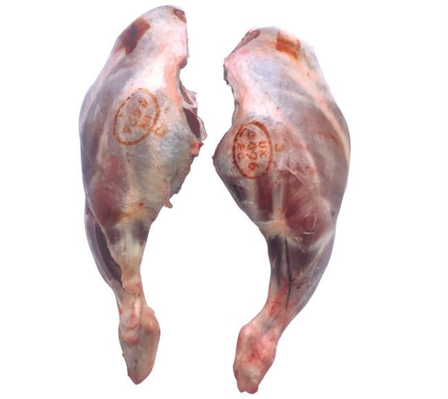 Two bone-in lamb legs, each with the HMC stamp