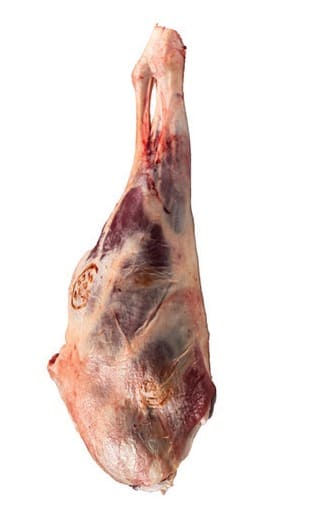 A bone-in mutton leg with the HMC stamp