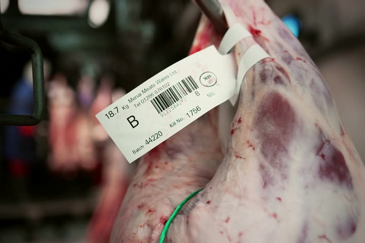 A carcass label showing the weight, grade and barcode